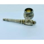 A 19th century Persian pipe with engraved decoration