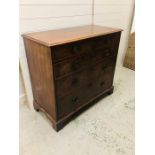 A Large Georgian mahogany two over three chest of drawers with octagonal brass handles on bracket