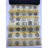 An Album and coin roll of Victorian and later coins