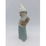 Lladro figure of a girl holding a cockerel