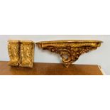 A Pair of shelf bracket sconces in gold gilt and a gold gilt wall shelf