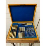 A Brass bound boxed cutlery set by John Nowell and Sons Sheffield