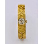 A 9ct gold Accurist 21 jewels ladies watch. (22.9g)