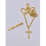 A 9ct yellow gold necklace with crucifix and tie pin (5.4g)