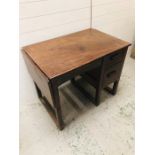 A Two drawer desk with drop leaf side in a simple style AF