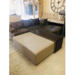 A large square light grey upholstered footstool/coffee table with leather bench with brass stud