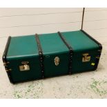 Green trunk with metal banding