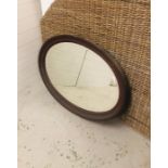 A Large wooden oval bevelled mirror (72cm X 100cm)