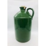 A rare Ink flagon, stoneware, in green.