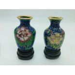 A Pair of miniature cloisonné pots on wooden stands