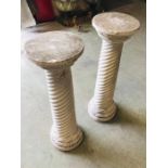 A Pair of stone garden pillar stands (97cm tall)