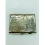 A silver cigarette case, makers mark WJM & Co