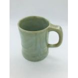 A Musical pottery ale mug