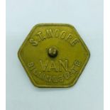 A Vintage Billingsgate hexagonal market token marked S T Moore Van Billingsgate and stamped 285 on