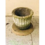 A Stone plant pot and base