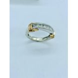 A 10ct mixed gold half eternity ring of 1/2ct approx.