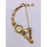 A 9ct gold vintage Ladies Aria watch (11.5g)