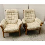 A Pair of mid century ercol easy chairs