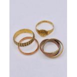 A selection of four 9ct gold rings. (10.4g)