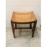 A Cane seated stool