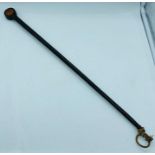 An Ebony cane or riding whip inscribed Dr W. Lee Spink, St Helena 1909