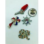 A selection of five George VI brooches celebrating his coronation.