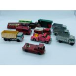 A Selection of eleven diecast Matchbox, diecast trucks and horsebox