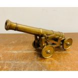 A Mid 19th century brass standing carriage and cannon