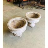 A Pair of white cast stone urns (37cm tall)