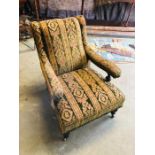 An Edwardian country house style chair with original fabric