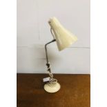 An Anglepoise desk lamp