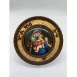 A framed miniature from Florence dated 1894, verso.