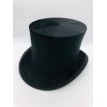 A silk Top Hat by Dunn & Co including box.