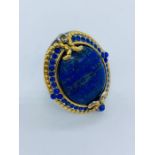 A Lapis Lazuli and silver mounted ring.