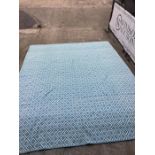 A Pair of aqua blue and white cotton rugs (237cm X 301cm)