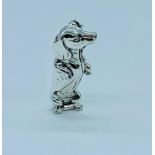 A Silver dog brooch