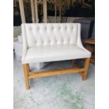 A Cream leather high backed club style double bar bench