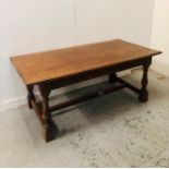 A Large solid oak refectory dining table on block feet (H75cm D89cm W183cm)