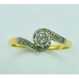 An 18ct gold ring with diamonds by A.W.C & S (marked zss1)