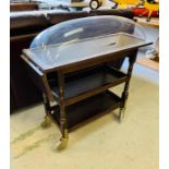 A serving trolley with dome lid
