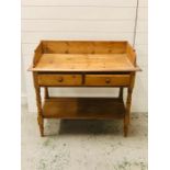 A pine washstand with two drawers