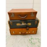 Three vintage luggage cases, Samsonite and Skyways