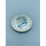 A 1998 Britannia One Ounce of Fine silver coin.