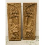 A pair of carved wooden panels (55cm x 18cm)