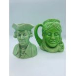 Two green character jugs