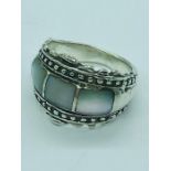 A Silver Ring with three shell panels