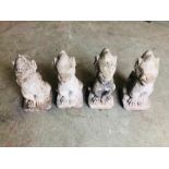 A Set of four stone dragon gargoyles