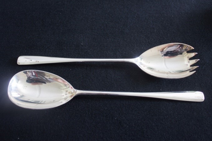 A Pair of silver salad servers, hallmarked London 1936 by EP & S.