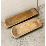 Two large wooden dough troughs