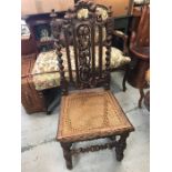 An oak Jacobean style lattice seated chair